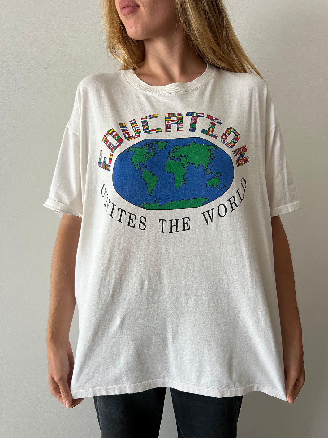 Education Unites The World tee